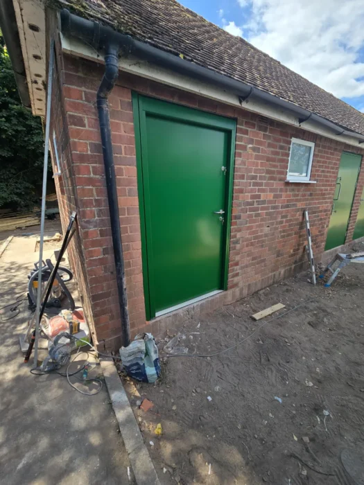 accessibility-compliant public toilet door installation with secure design