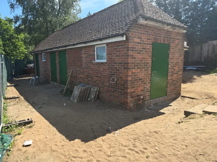 modern public toilet door refurbishment improving safety and usability